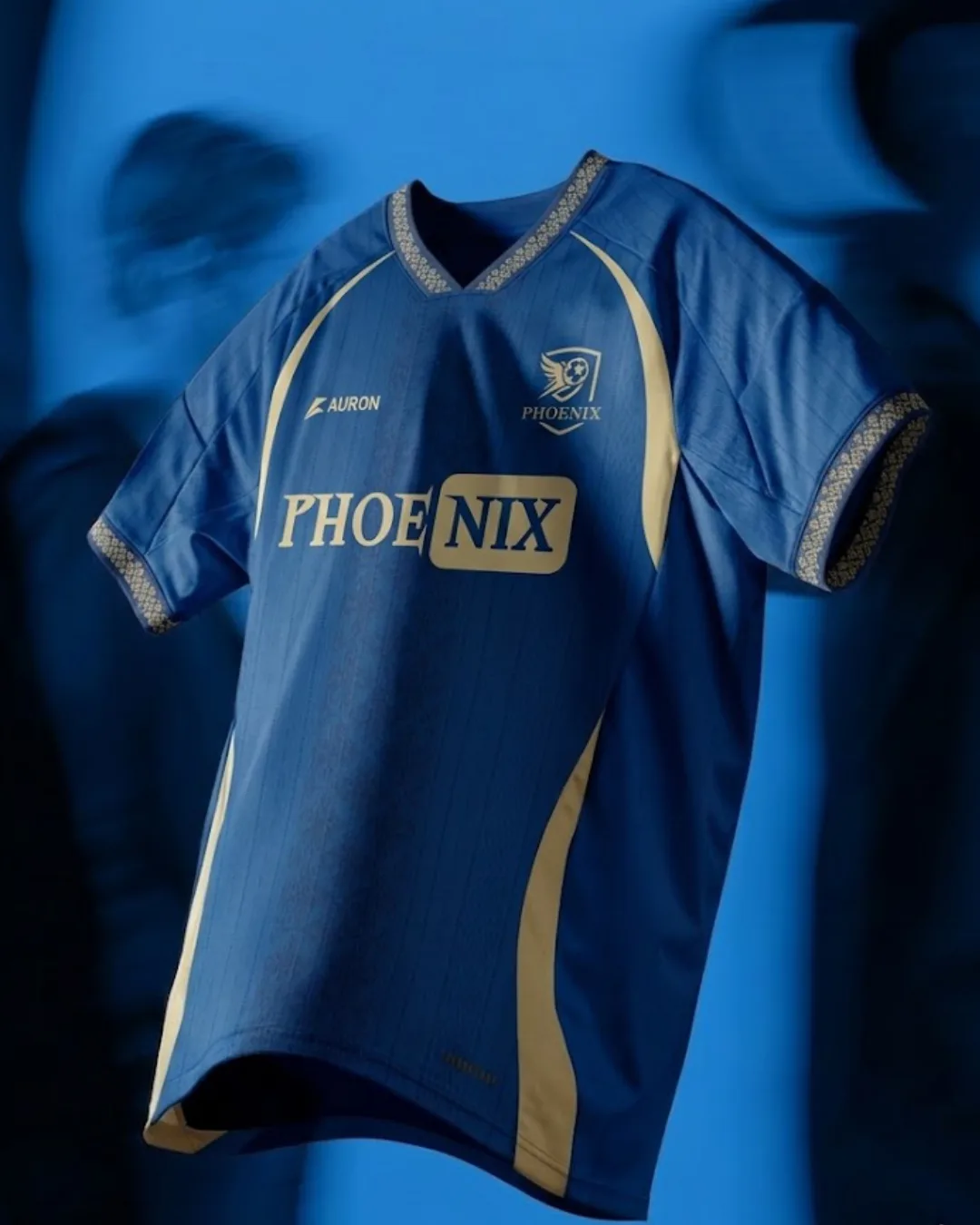 Jersey Phoenix biru dengan detail emas dari Auron Factory